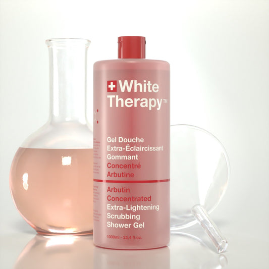 White Therapy + Gel de Ducha Exfoliante Extra-Aclarante Concentrado con Arbutina
